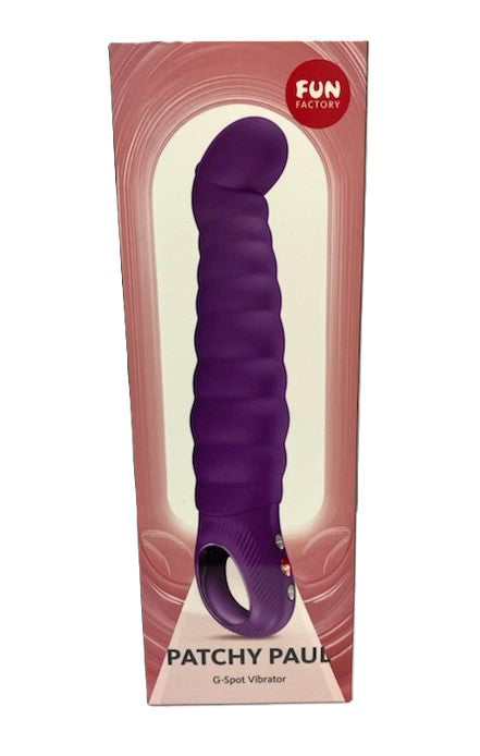 Fun Factory Patchy Paul G-Spot Vibrator Dark Violet in its packaging featuring a curved, ribbed design.