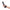 b-Vibe Essentials 7 Inch Smooth Silicone Dildo Black held in hand against a white background.
