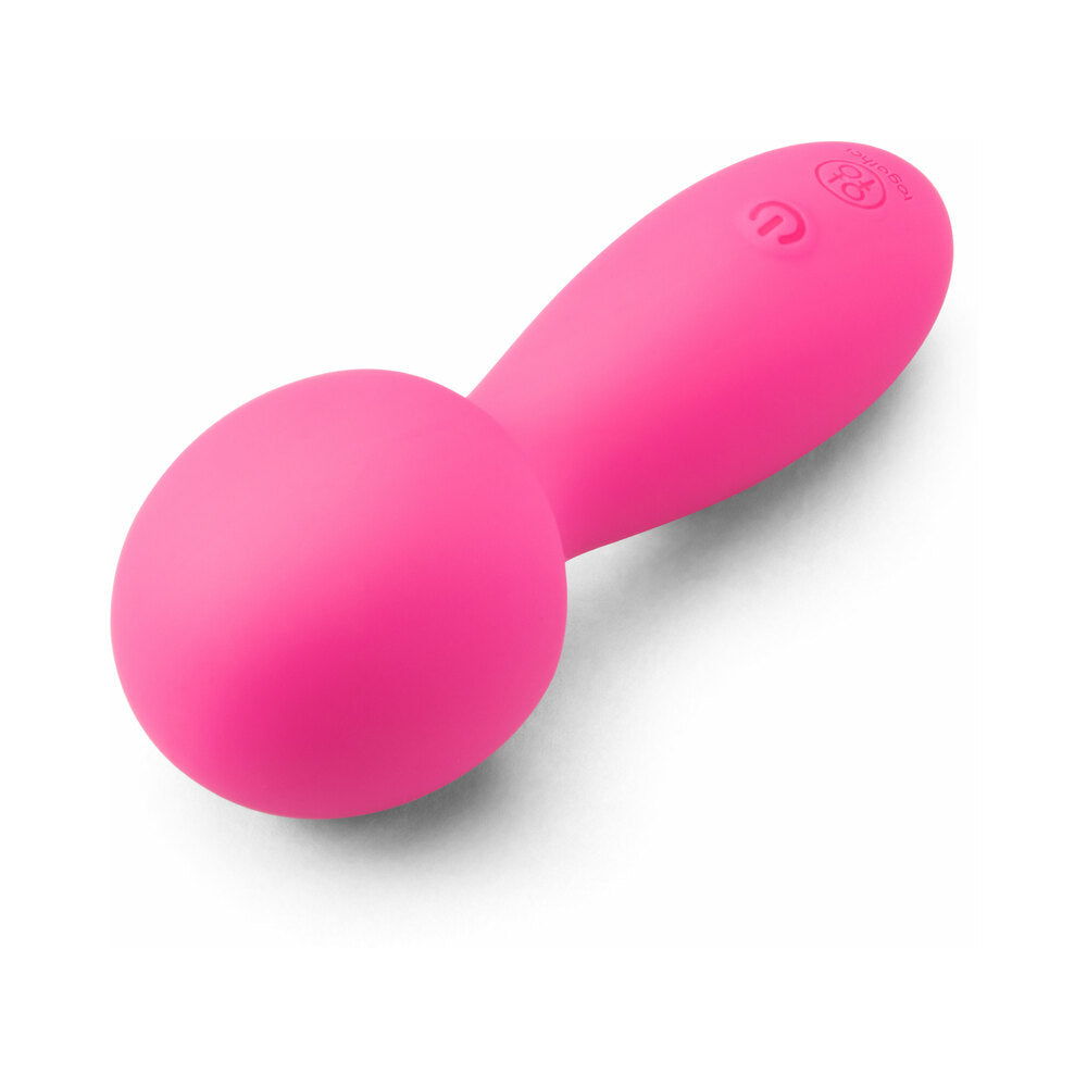 Together Spark On The Go Mini Wand Vibrator in vibrant pink color designed for travel convenience.