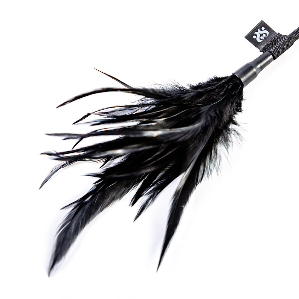 Sei Mio Double Standards Whip and Tickler featuring soft black feathers for teasing and light impact play.
