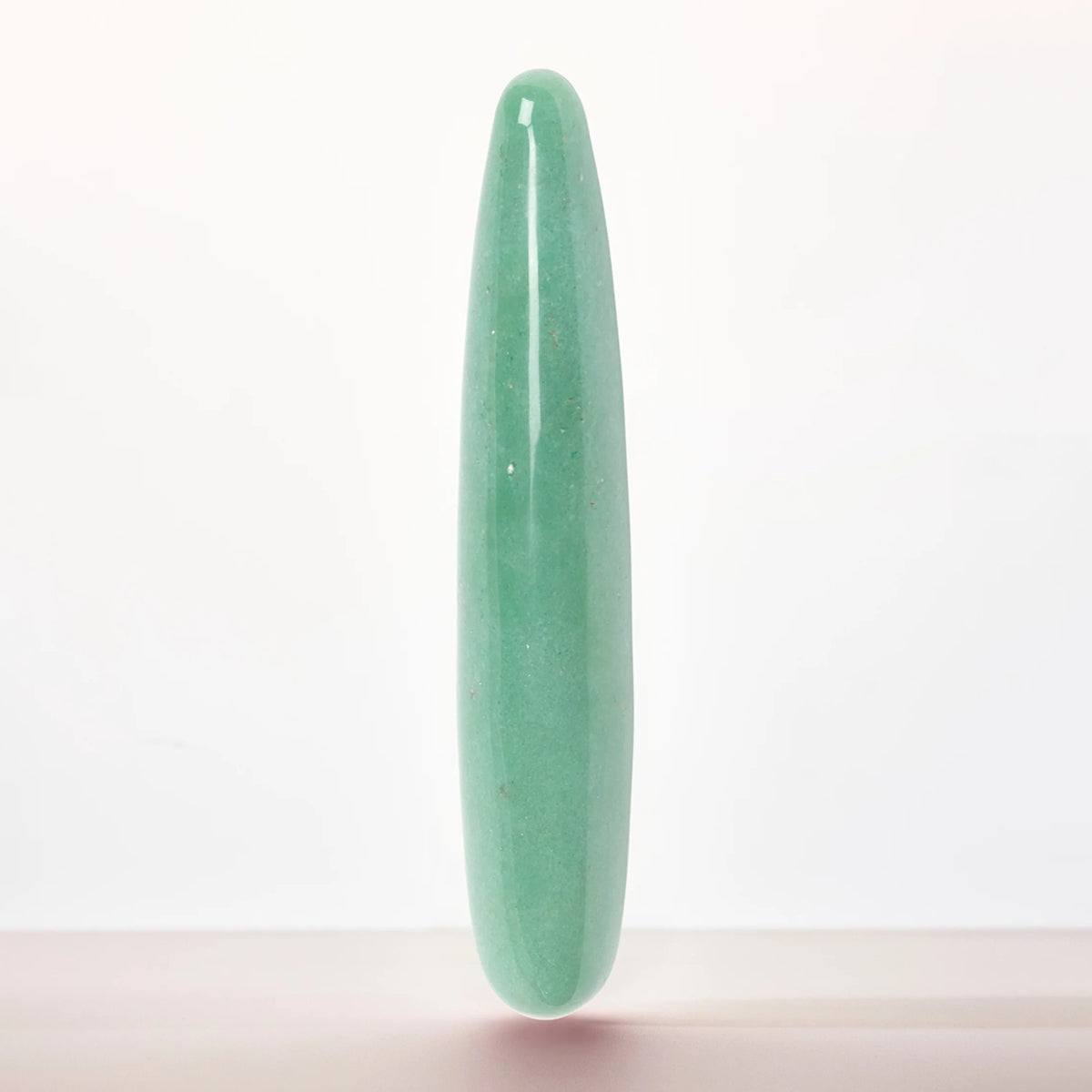 Chakrubs Indian Jade Slim Crystal Dildo, a smooth, elegant jade crystal wand for intimate wellness.