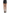 Leg Avenue Spandex Sheer Sword Backseam Tights Black showcased with a black mini skirt and heels.
