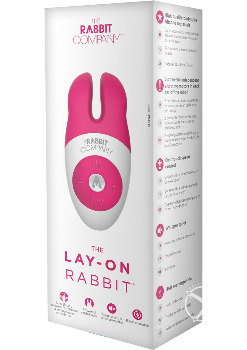 The Rabbit Company Lay On Rabbit Massager Hot Pink packaging featuring dual motors and body-safe silicone material.