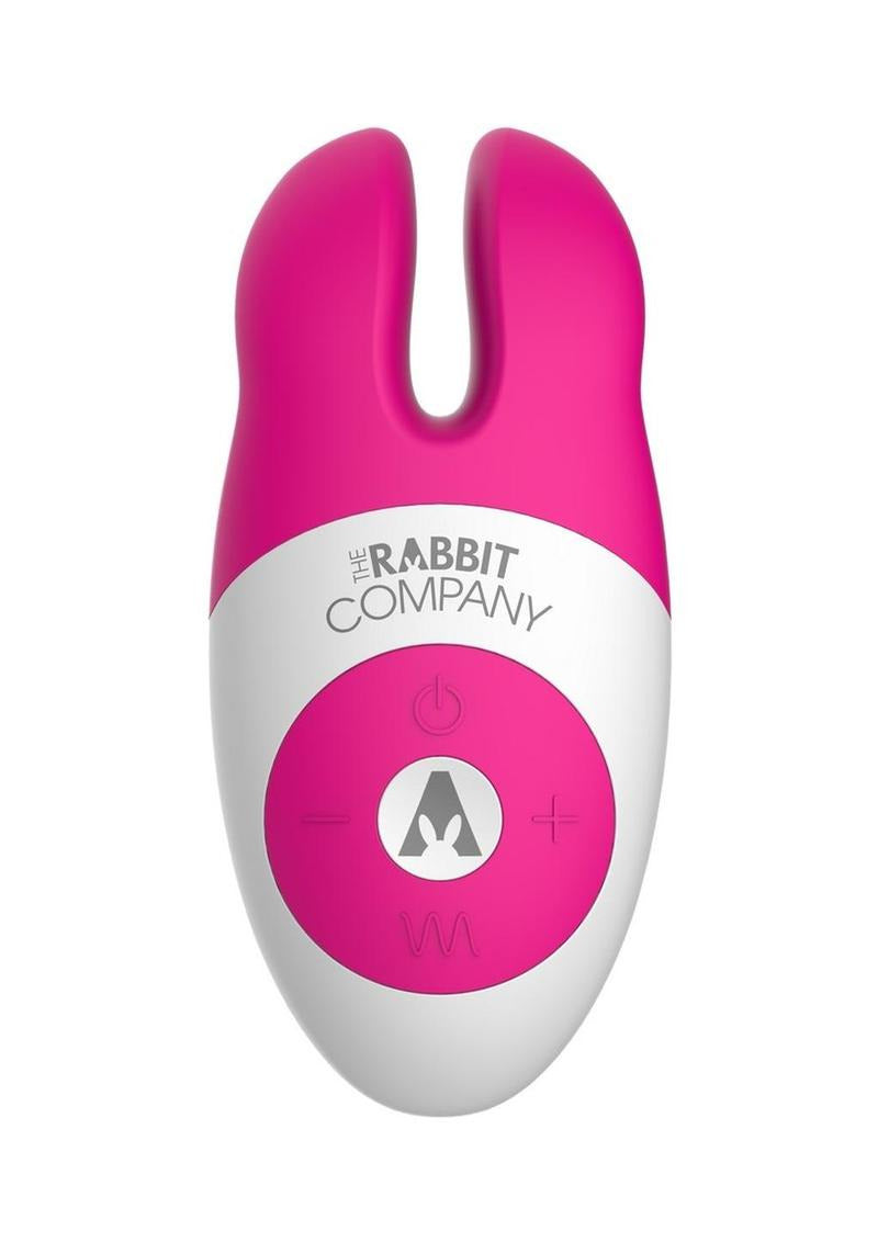 The Rabbit Company Lay On Rabbit Massager Hot Pink displayed from the front, showcasing its dual-stimulation design and controls.