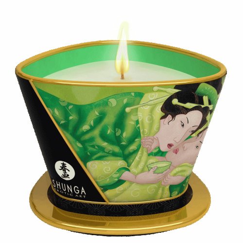 Shunga Massage Candle Exotic Green Tea 5.7 Oz featuring a green candle with artistic design and lit flame.