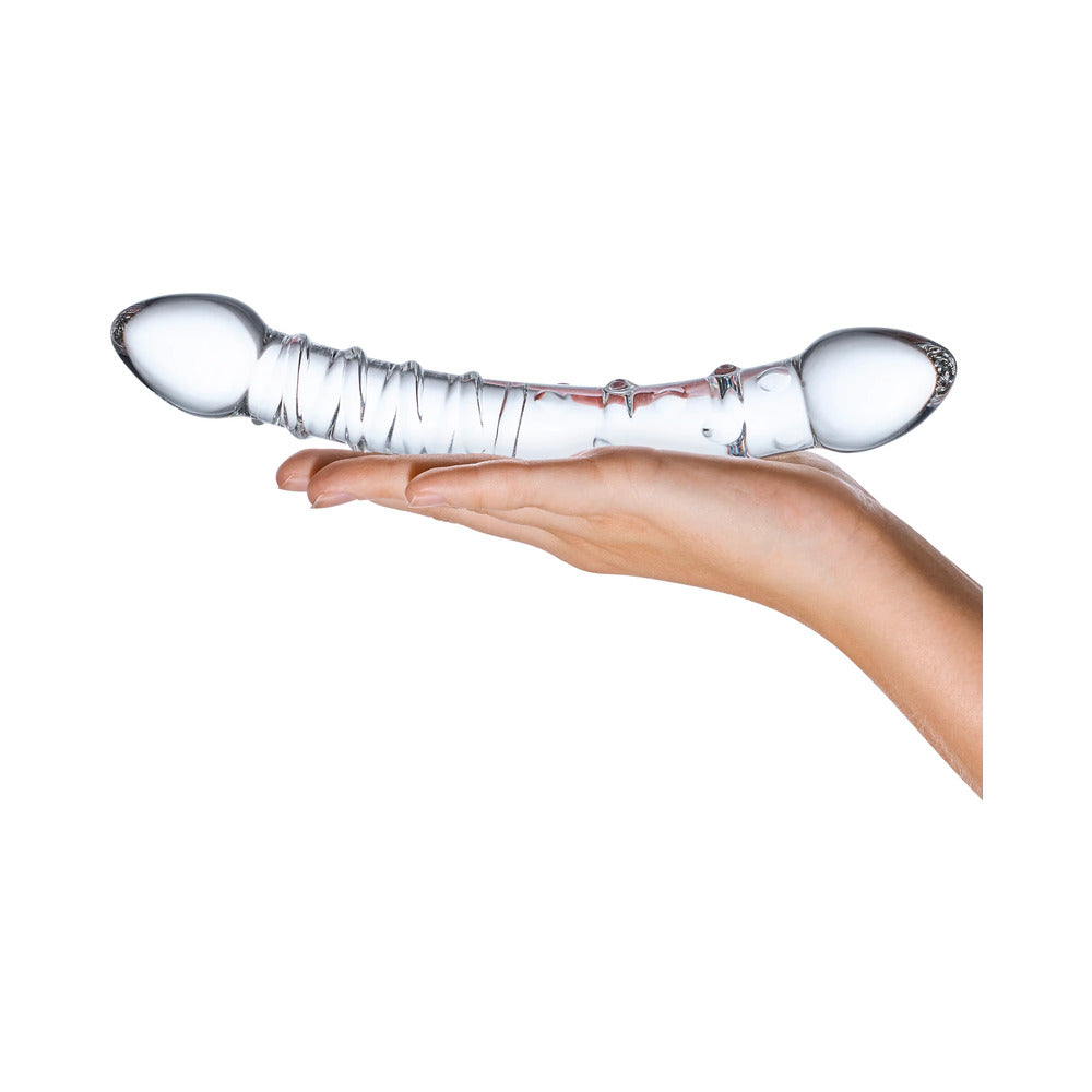 Double Trouble Glass Dildo 10 inches held in hand, showcasing its elegant design and double-ended functionality.
