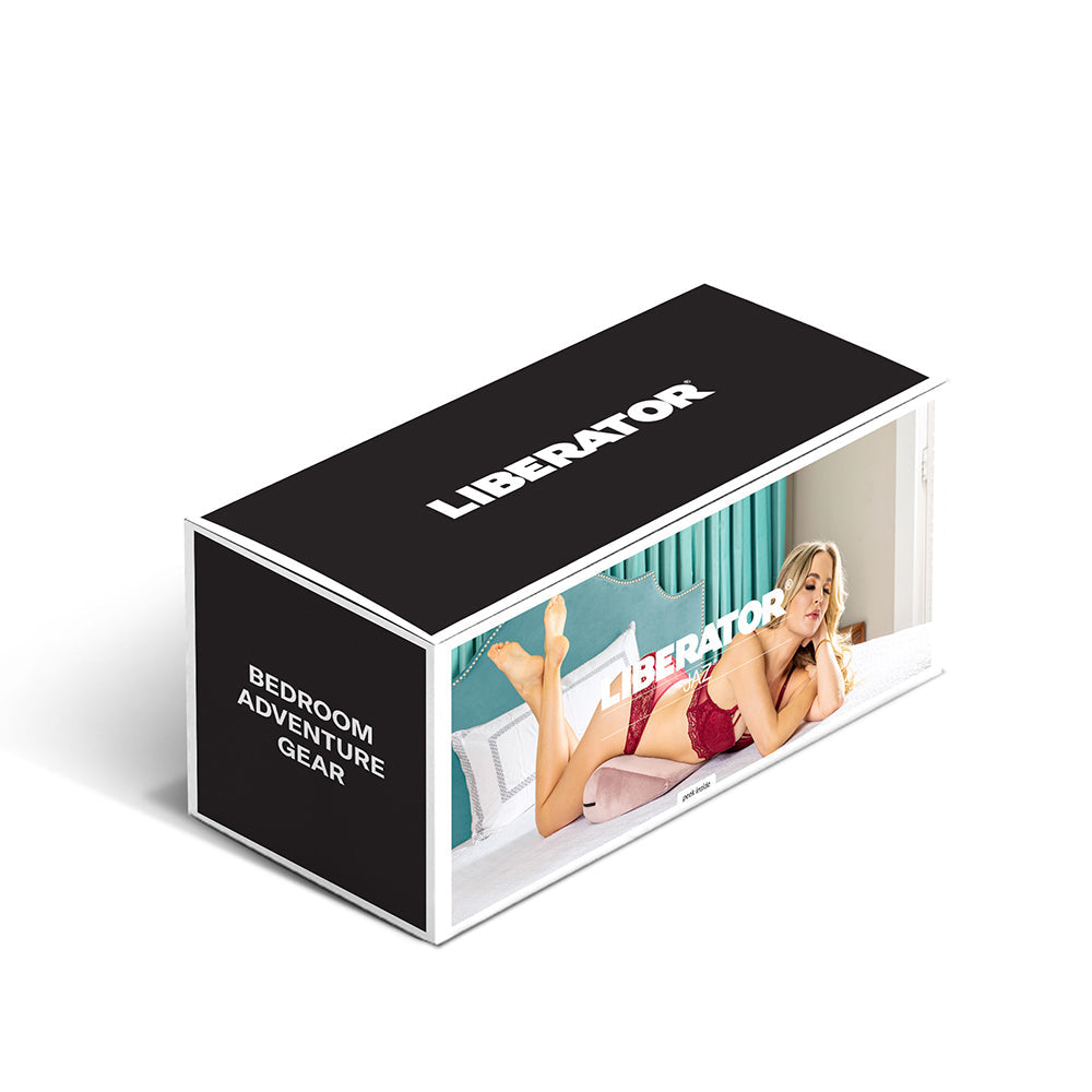 Liberator Jaz Original Rose Sex Positioning Pillow packaging with model in bedroom setting.