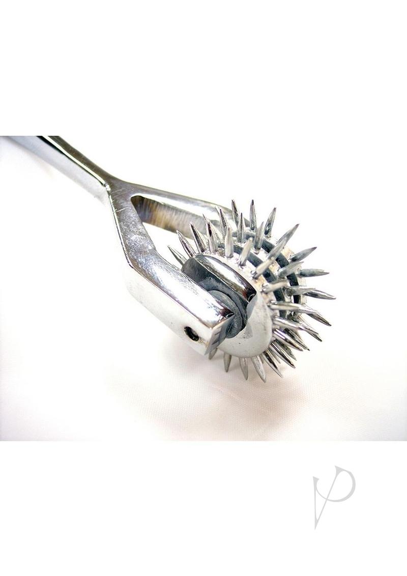 Close-up of Rouge Triple Stainless Steel Pinwheel Silver showcasing three spinning wheels for sensory play.