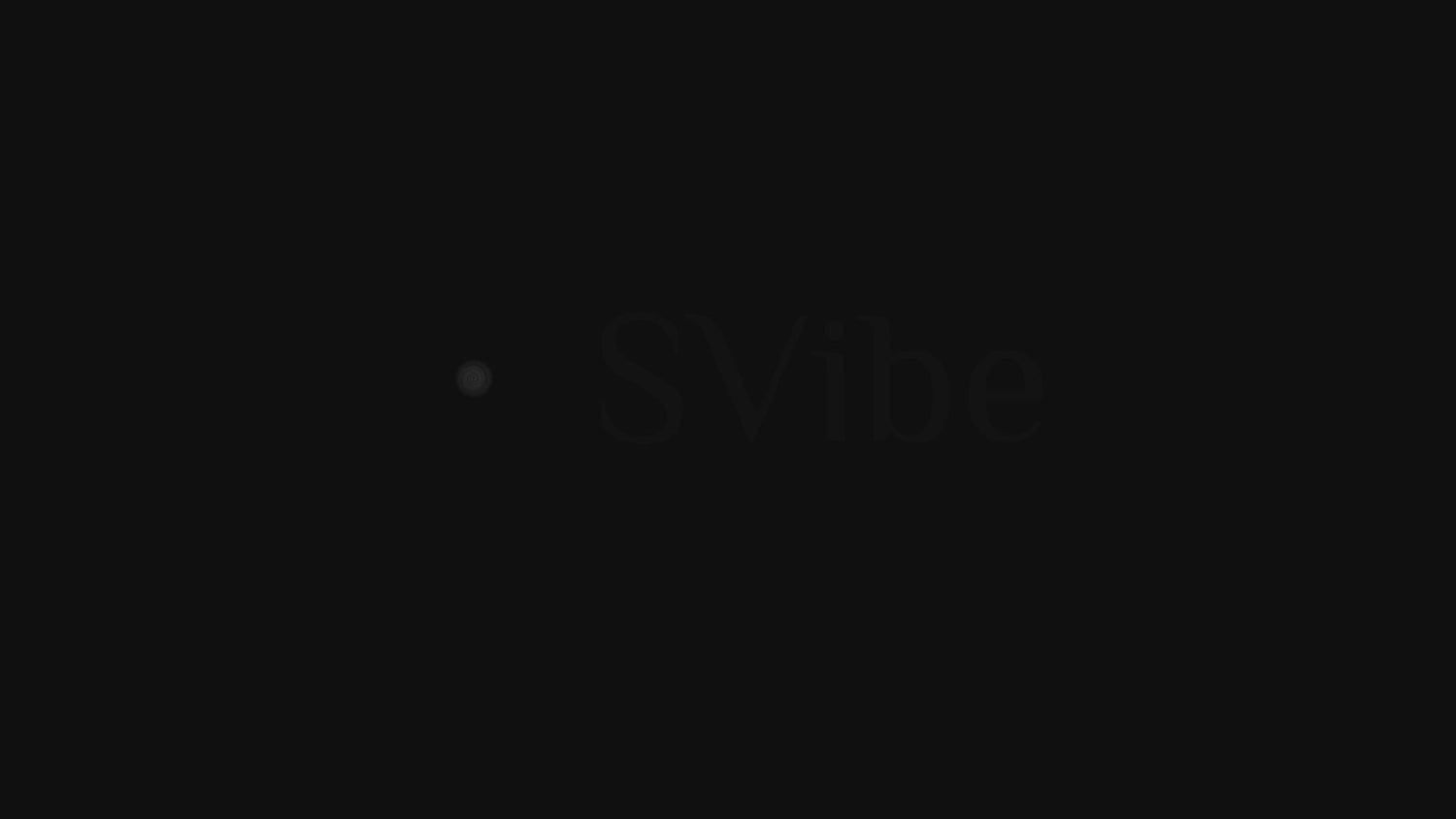 SVibe Snail Jovi Dual Couples Ring Stimulator Black on a dark background, featuring its ergonomic design for intimacy enhancement.
