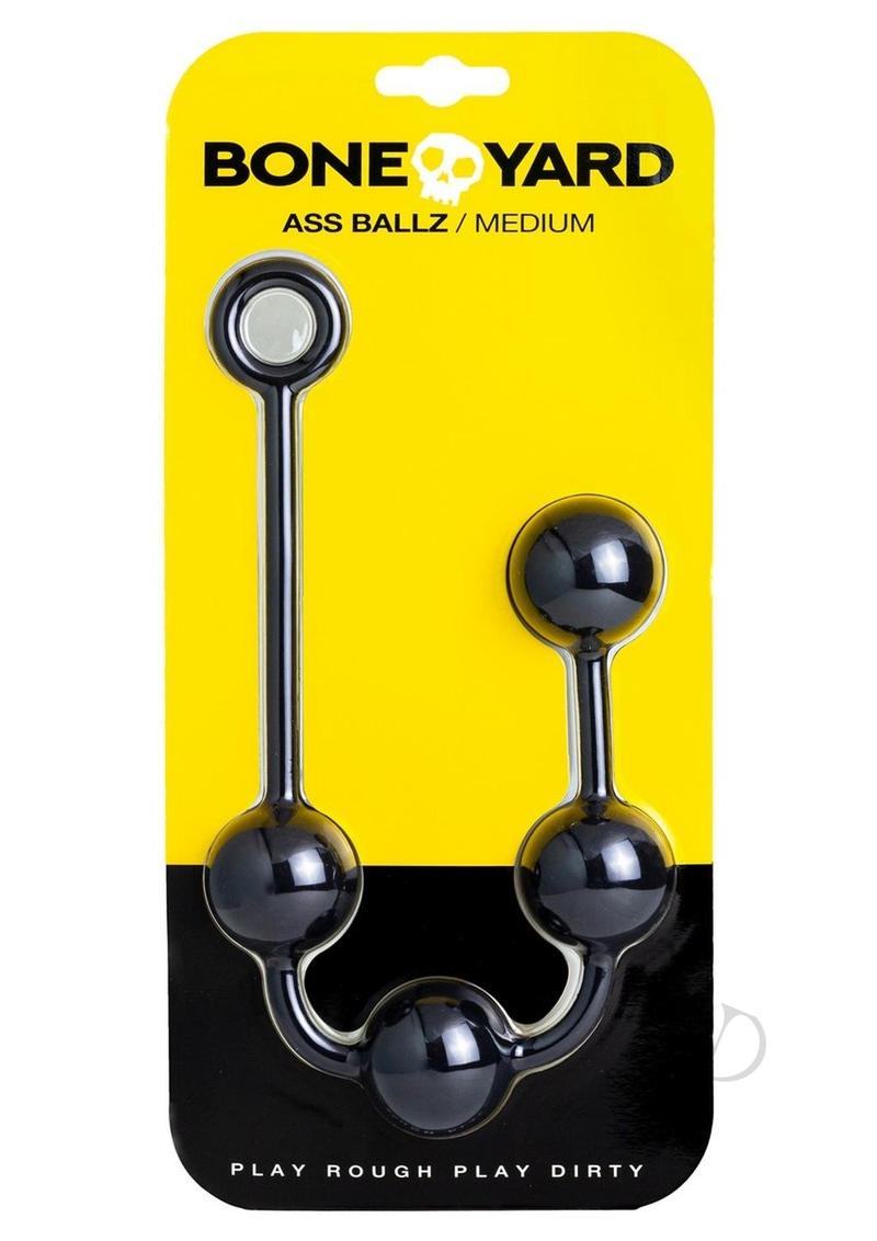 Boneyard Ass Ballz Silicone Anal Beads Medium Black packaging with black silicone beads on a yellow background.