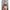 Back view of a model wearing Fantasy Lingerie Easy Rider Biker Costume Set 3X/4X Black with fishnet and glossy details.