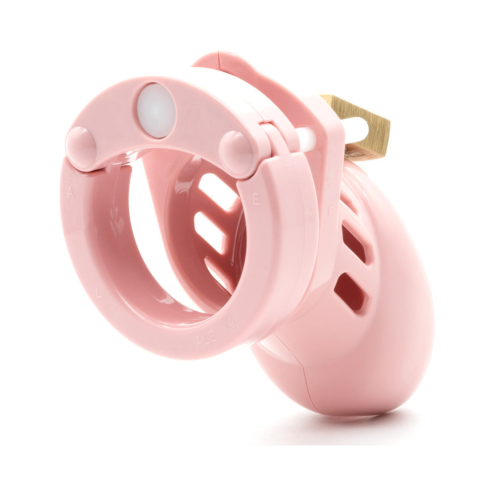 CB-6000S Pink Male Chastity Cage showcasing its lightweight and body-safe construction.