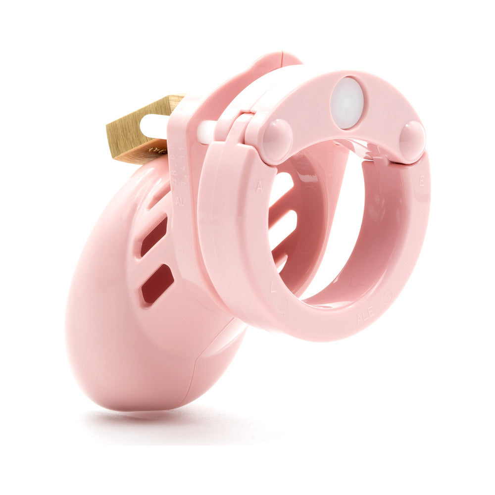 CB-6000S Pink Male Chastity Cage in a close-up view, showcasing its durable and hypoallergenic design.