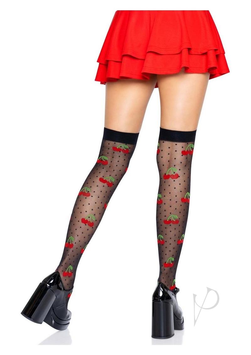 Leg Avenue Sheer Polka Dot Cherry Thigh Highs Black Red worn with a red skirt and black high-heeled shoes.