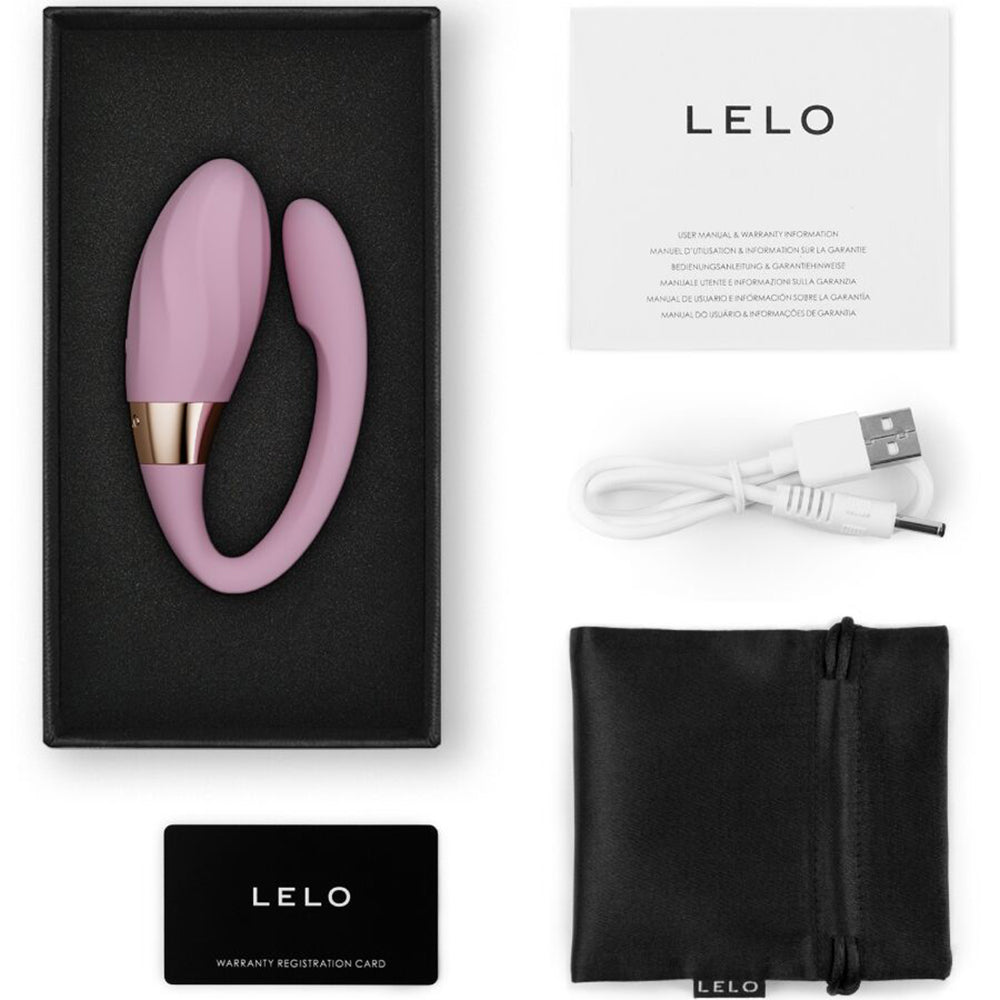 Lelo Tiani Twist Dual Action Couples Massager Soft Pink in packaging with accessories and warranty card.