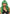 Leg Avenue Misfit 24 Inch Long Wavy Bang Wig Green worn by a model, featuring vibrant green tones and full bangs.
