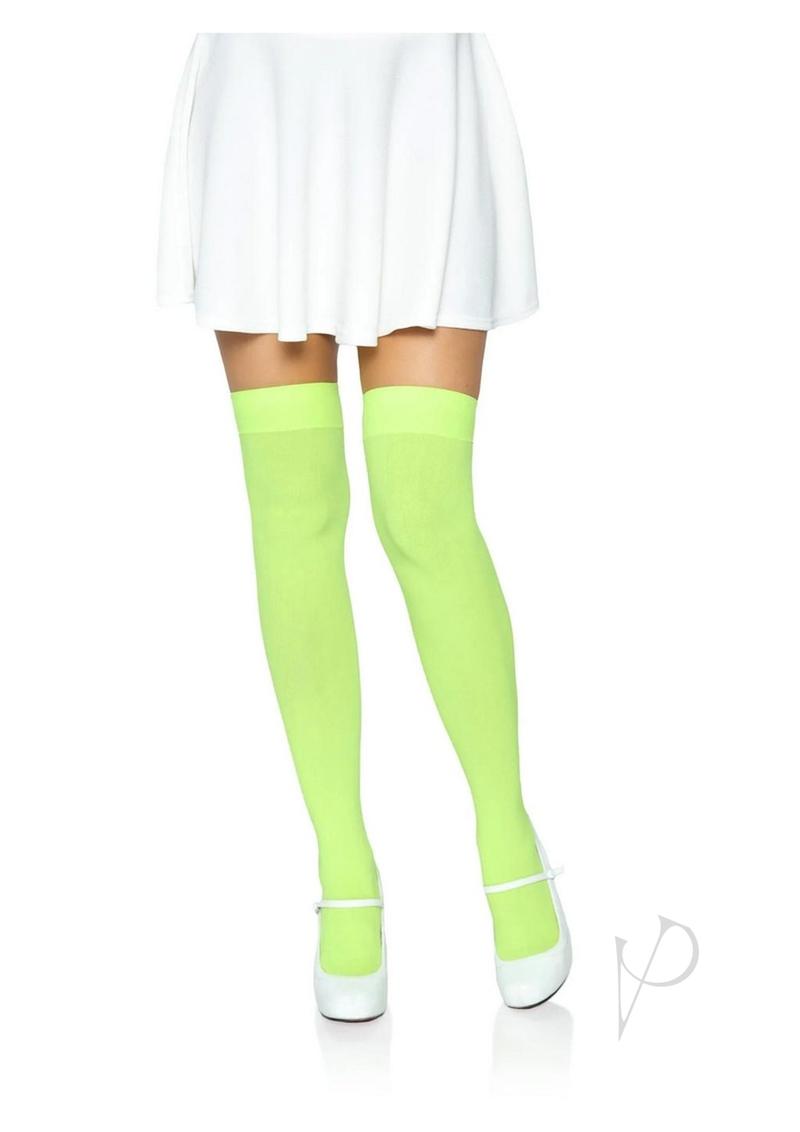 Leg Avenue Nylon Over The Knee Socks One Size Neon Green styled with a white skirt, perfect for vibrant outfits.