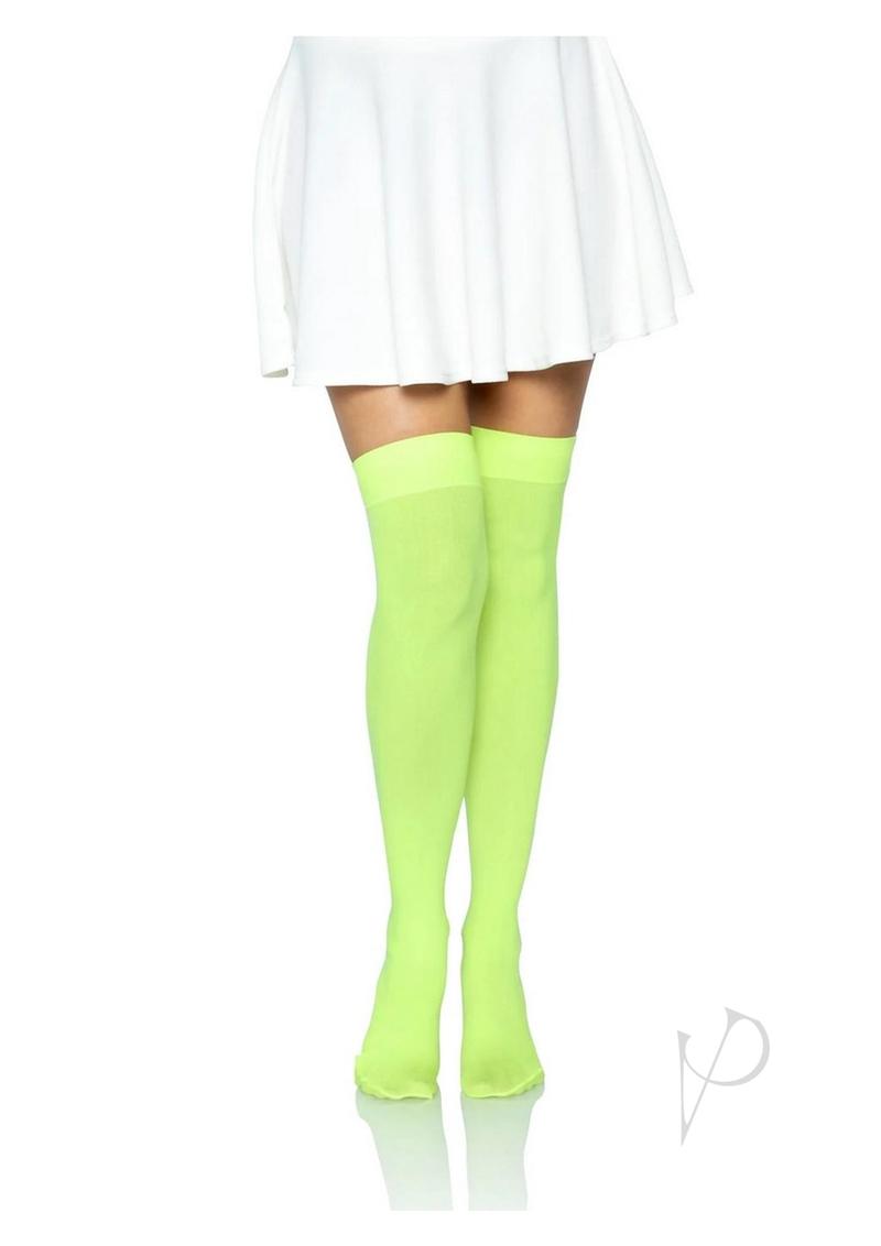 Leg Avenue Nylon Over The Knee Socks One Size Neon Green styled with a white skirt for a vibrant look.