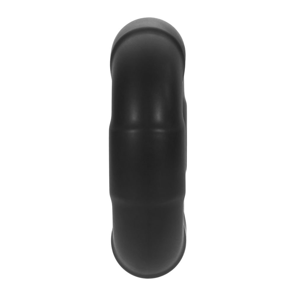 Forto F-33 Liquid Silicone Cockring Large Black from a top view, showcasing its smooth black design and seamless structure.