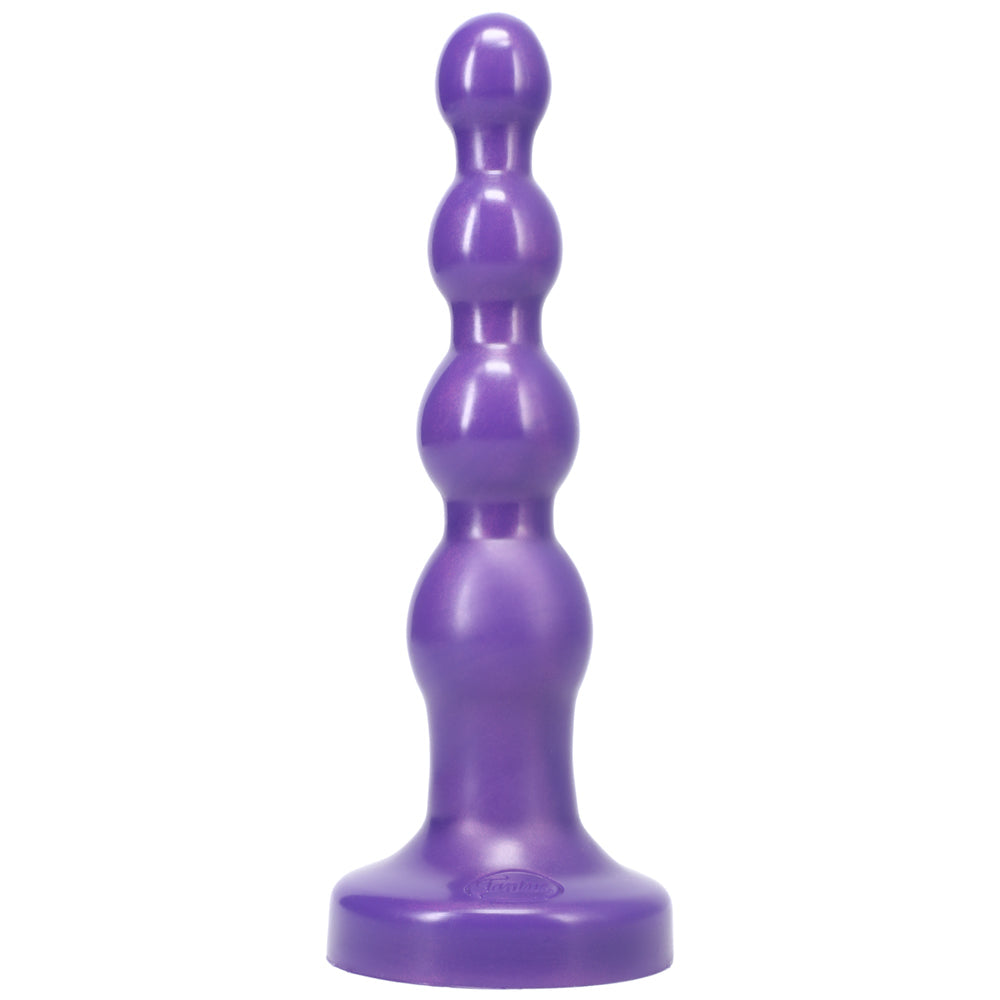 Tantus Ripple Large Beaded Anal Plug Midnight Purple showcasing smooth contours and graduated beads for versatile stimulation.