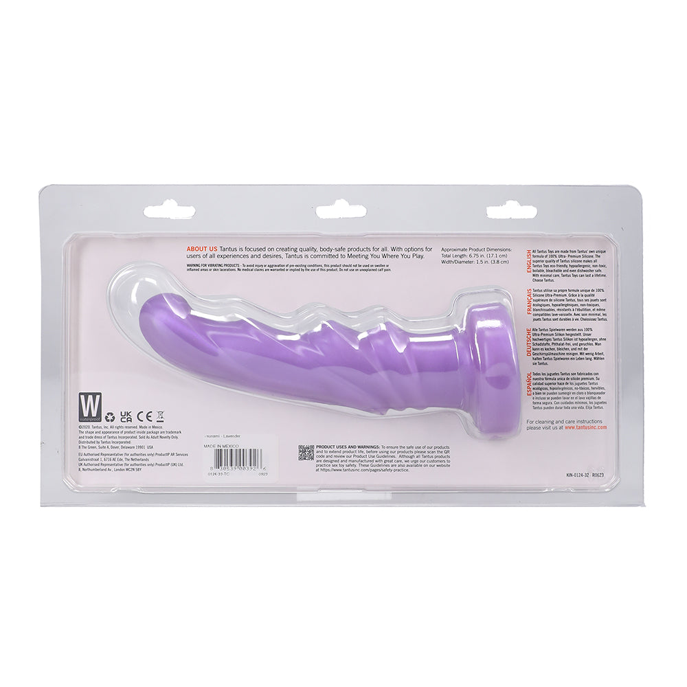 Tantus Tsunami Vibrating G-Spot Dildo Lavender in packaging showcasing its sleek design and anatomical waves.