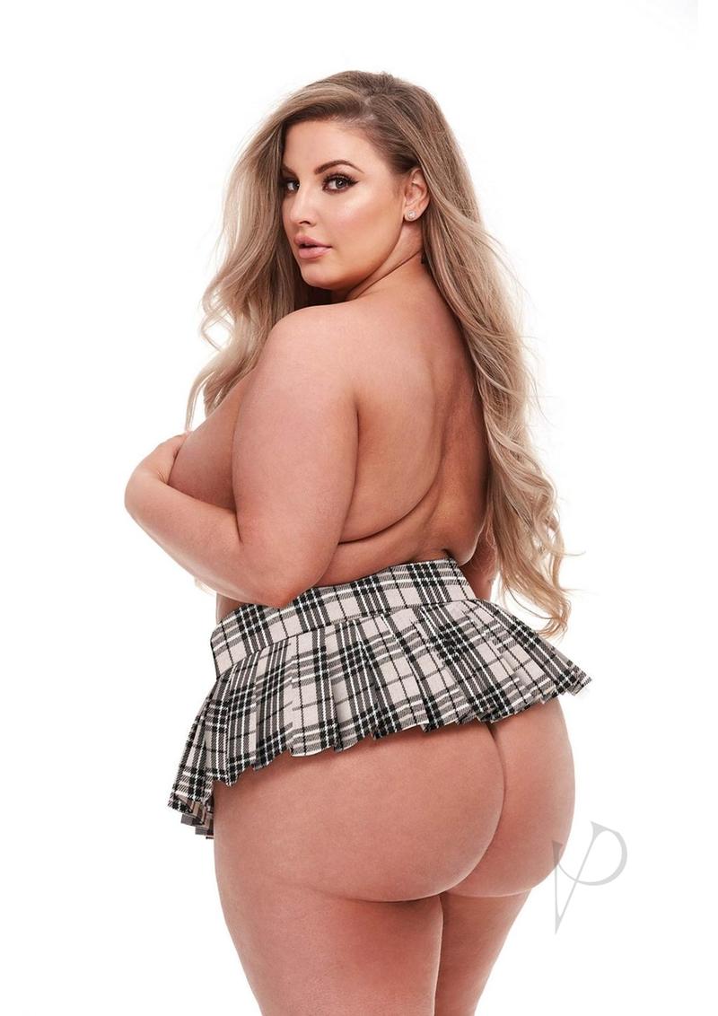 Teacher's Pet Standard Plaid Schoolgirl Skirt Queen Camel showcased on a model from the back, highlighting the playful plaid design.