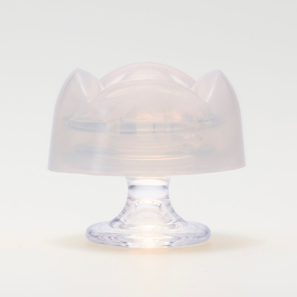 Iroha Petit Lily Disposable Clitoral Massager Clear showing its unique design and gel-like texture for external pleasure.