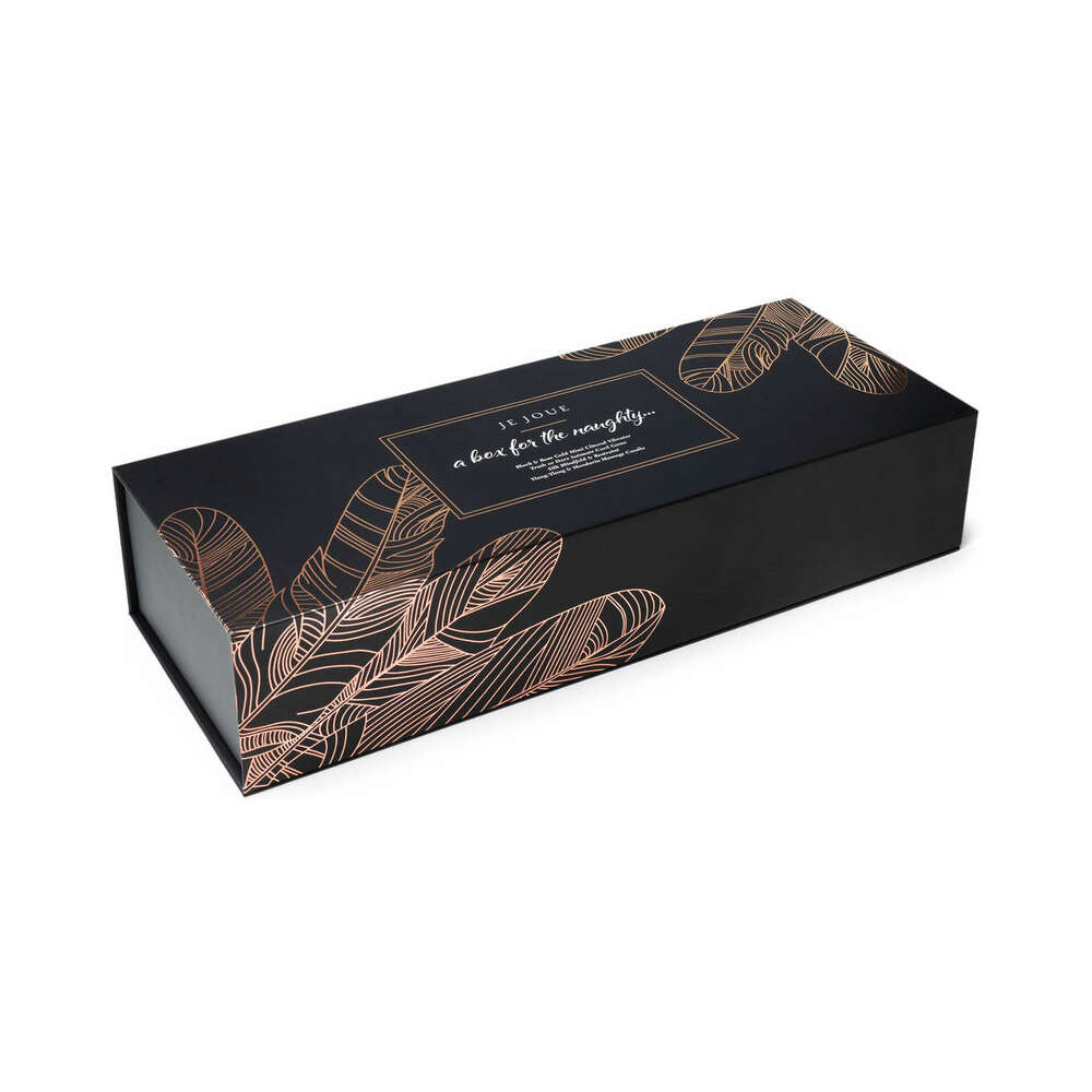 Je Joue The Naughty Collection 4-piece Gift Set elegant packaging featuring rose gold feathers.