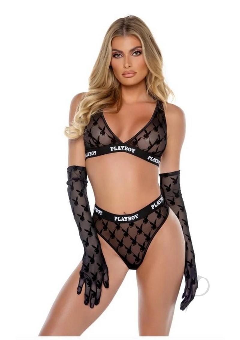Playboy Flocked Bunny Bra Set Large Black worn by model with matching thong and gloves in a striking pose.