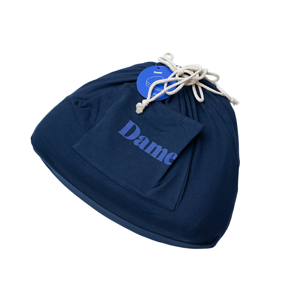 Dame Pillo Sex Position Pillow Indigo in navy fabric with drawstring and pocket design.
