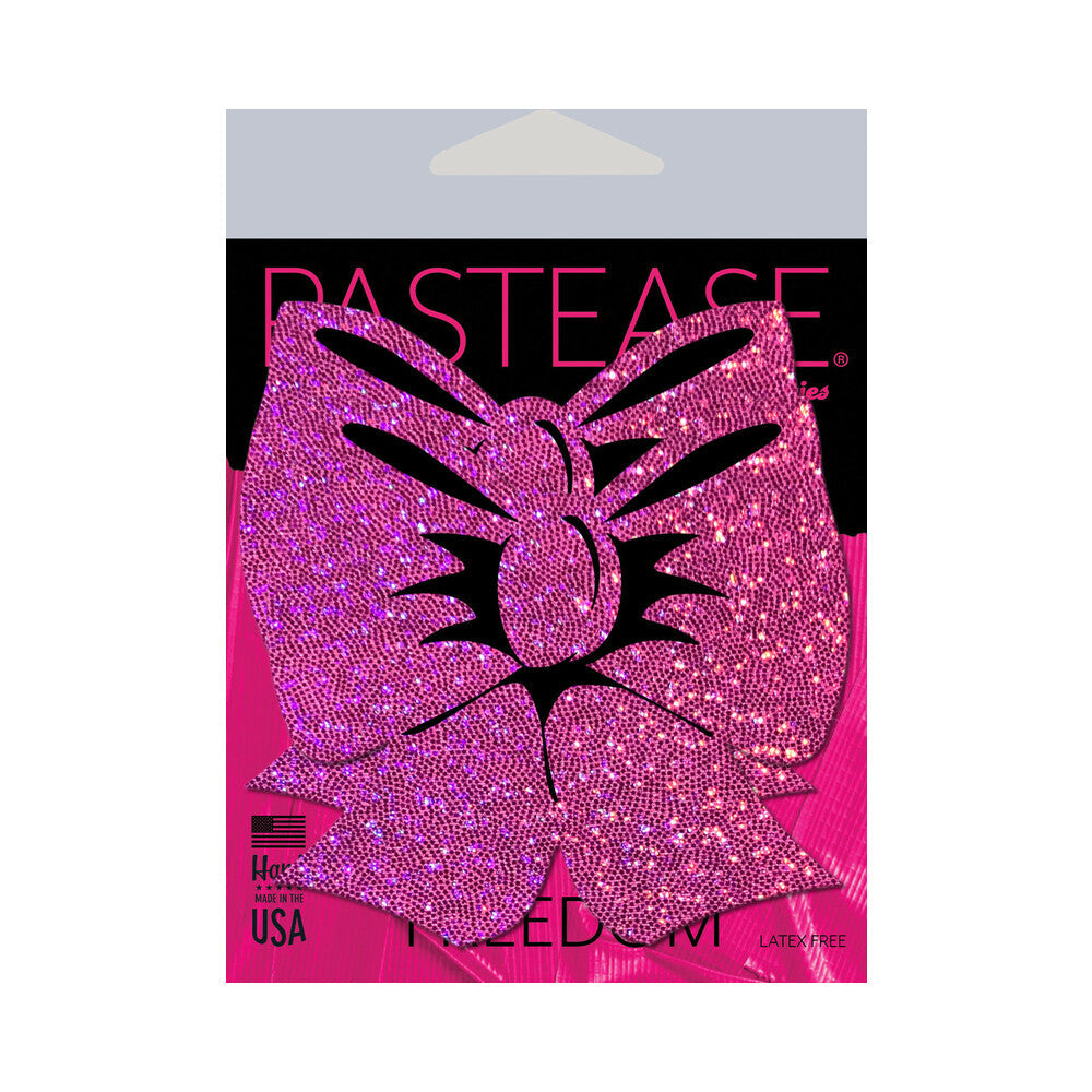 Pastease Hot Pink Glitter Bow Nipple Pasties packaging featuring glittery bow design, handmade in the USA, playful accessory.