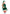 Woman wearing Leg Avenue HoHo Hottie 4 Piece Santa Costume Green White XS with festive hat and stockings.
