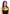 Pleasure Wigs Collection Christina Wig Rainbow model showcasing colorful hairstyle with bold rainbow hues.