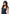 Pleasure Wigs Collection Jessie Wig Brown on model with long dark brown hair and denim outfit.