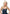 Pleasure Wigs Collection Jessie Wig Platinum Blonde styled on a model with long, wavy, icy blonde hair.