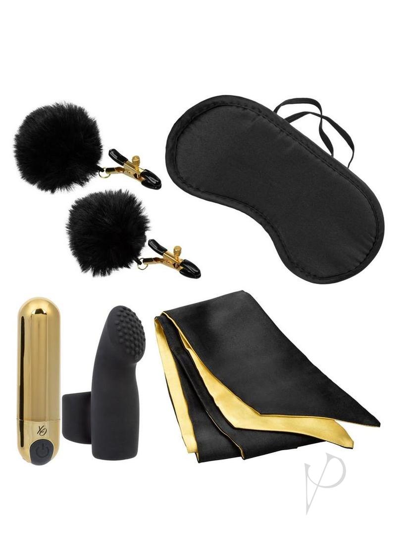 Pleasure Kits Untamed Collection Bondage Kit featuring clamps, eye mask, bullet vibrator, and satin ties.