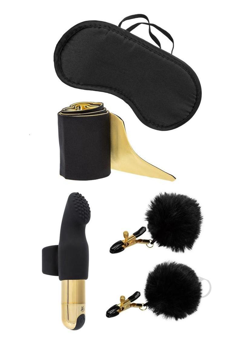 Pleasure Kits Untamed Collection Bondage Kit including eye mask, satin tie, nipple clamps, bullet, and finger teaser.