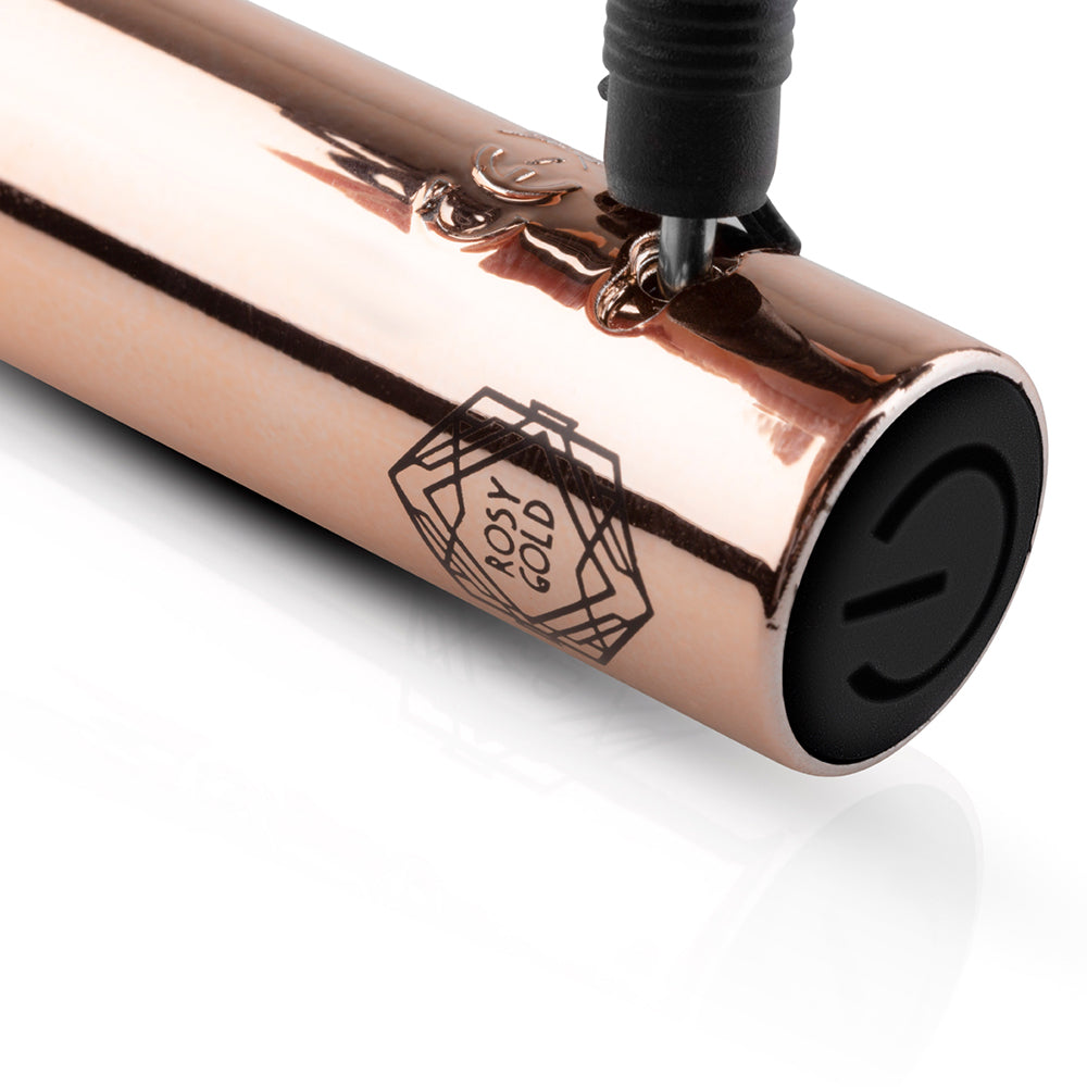 Close-up of the Rosy Gold Nouveau G-spot Vibrator highlighting its sleek design and elegant rose gold finish.