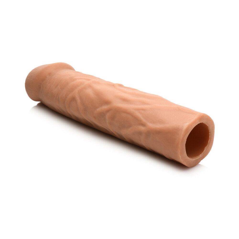 Jock Extra Long Penis Extension Sleeve 1.5 inch Medium showcasing its lifelike texture and flexible design.