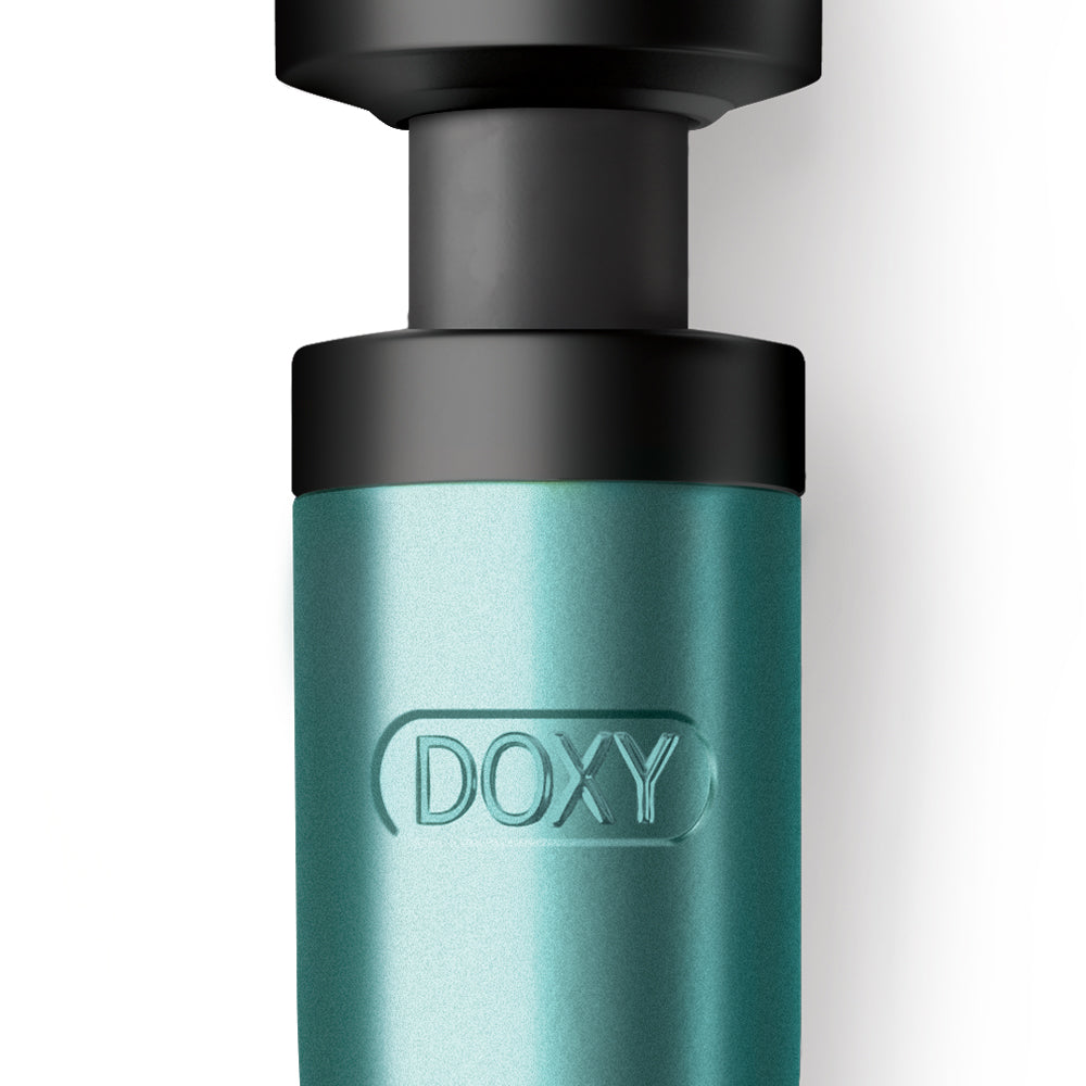Doxy USB-C Wand Vibrator Turquoise close-up view showcasing its design and branding.