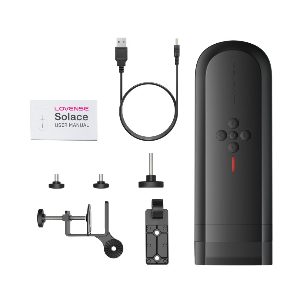 Lovense Solace Automatic Thrusting Masturbator and accessories including USB cable and user manual.