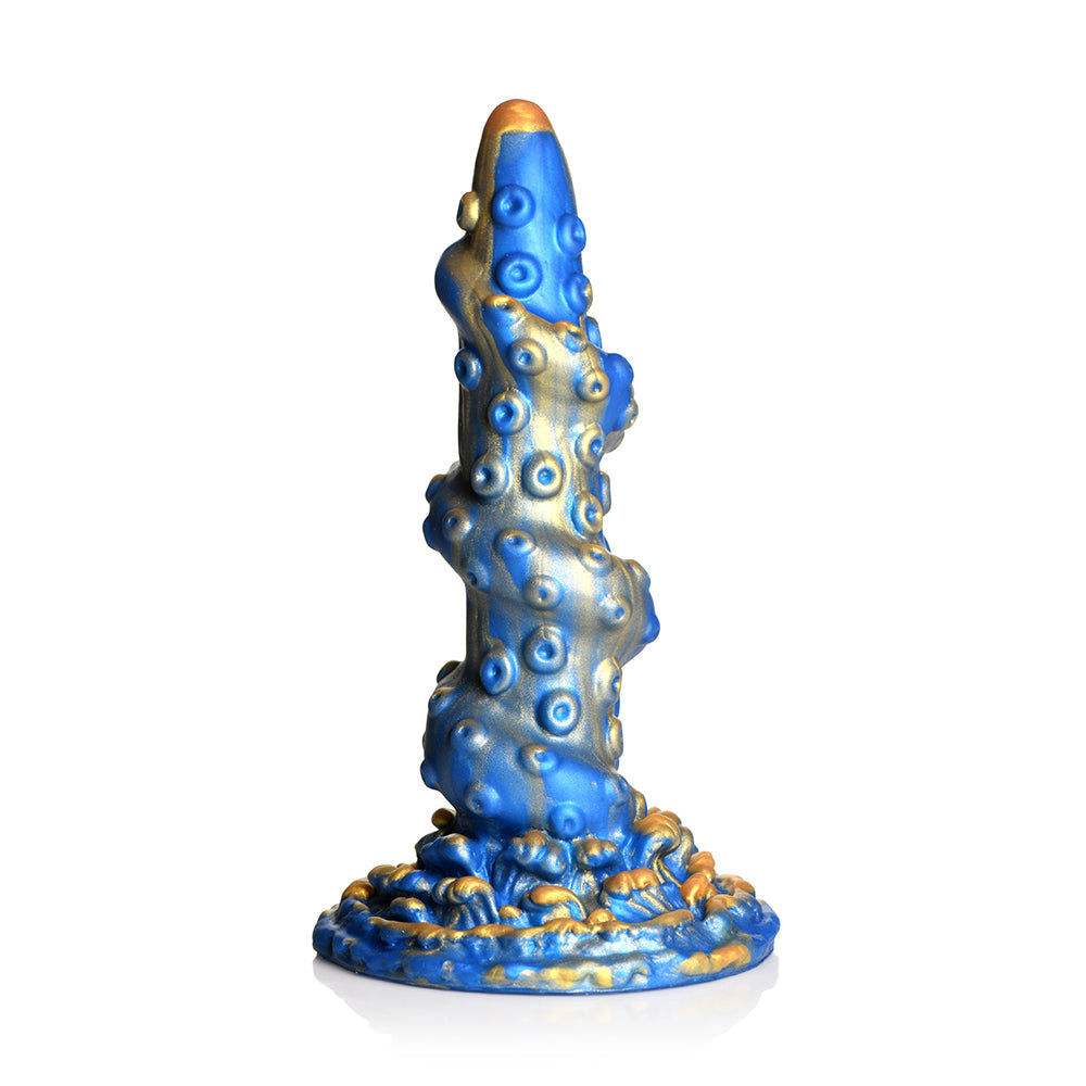 Creature Cocks Kraken Silicone Dildo with textured blue and gold design and realistic octopus-like details.