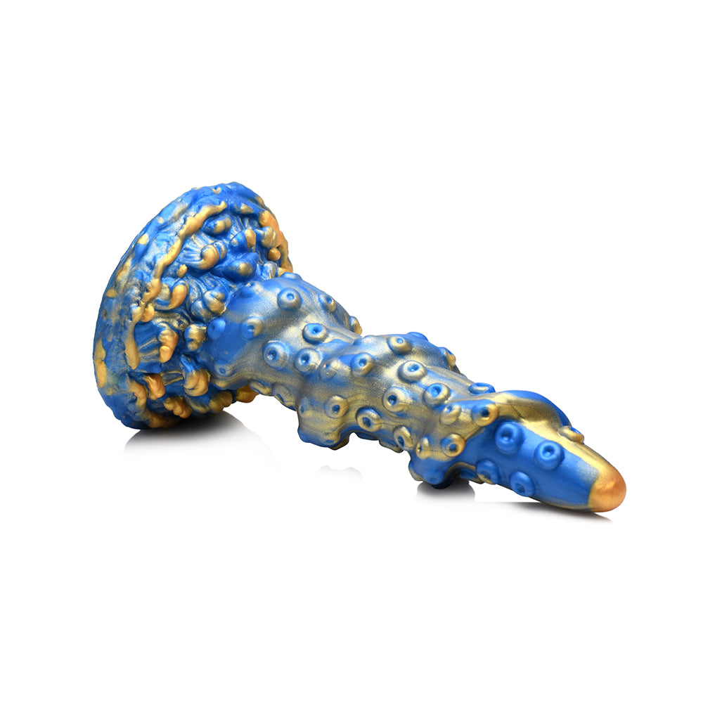Creature Cocks Kraken Silicone Dildo showcasing a mythical ocean creature design with vibrant blue and gold colors.
