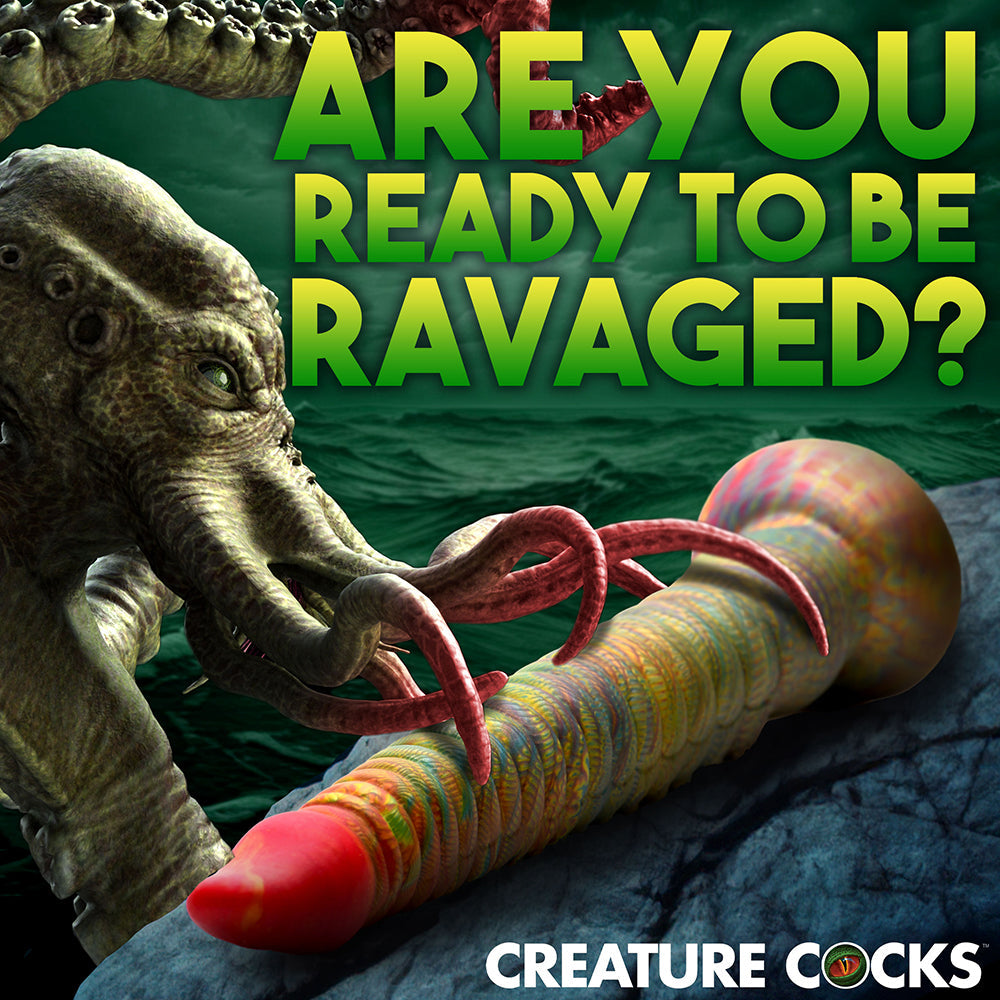 Creature Cocks Tenta-Dick Tentacle Silicone Dildo alongside a tentacled creature, inviting adventure and exploration.