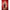 Fantasy Lingerie Play Wild Card Jester Costume Set Red L/XL showcased on model against a bold red background.