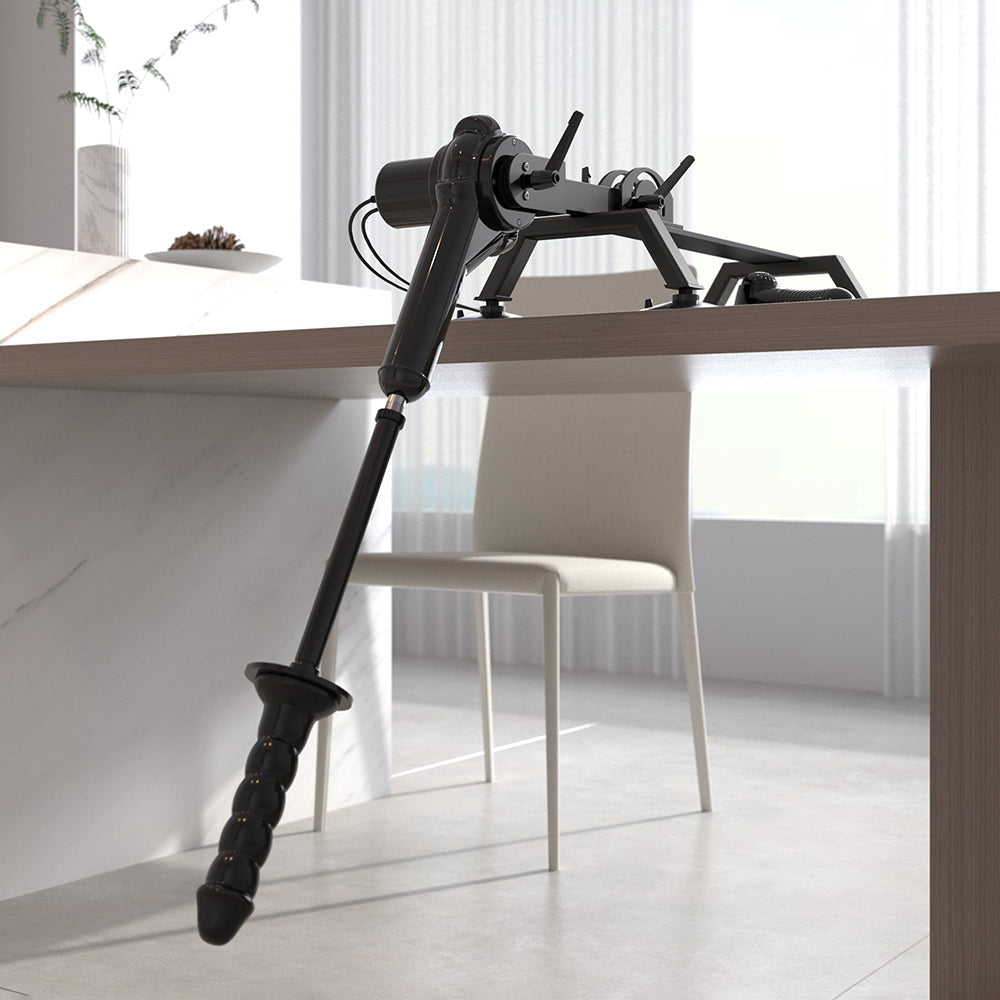 Fetish Fantasy Series Body Dock Sex Machine positioned on a table with suction cup base and adjustable thrusting device.