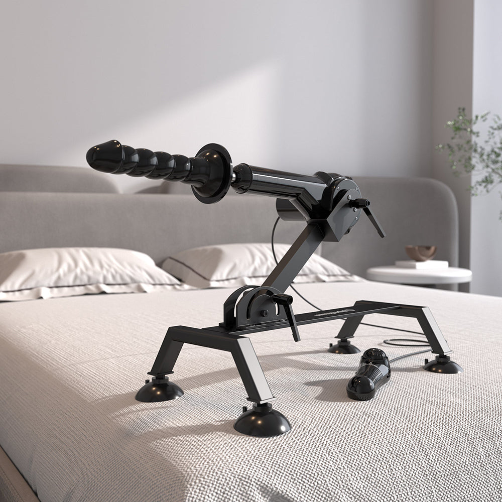 Fetish Fantasy Series Body Dock Sex Machine positioned on a bed with a focus on its adjustable thrusting feature.