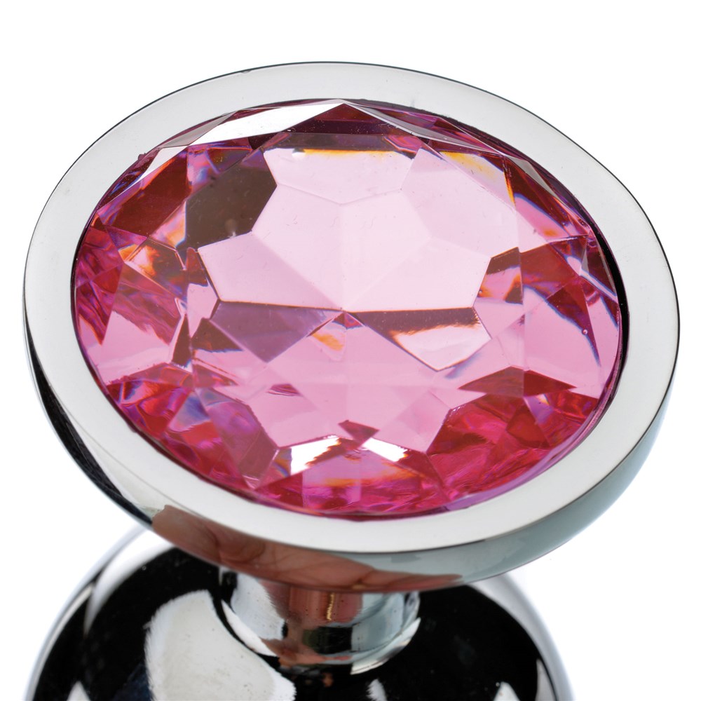 Close-up of the Adam & Eve Pink Gem Anal Plug Large featuring a sparkling pink gem top.