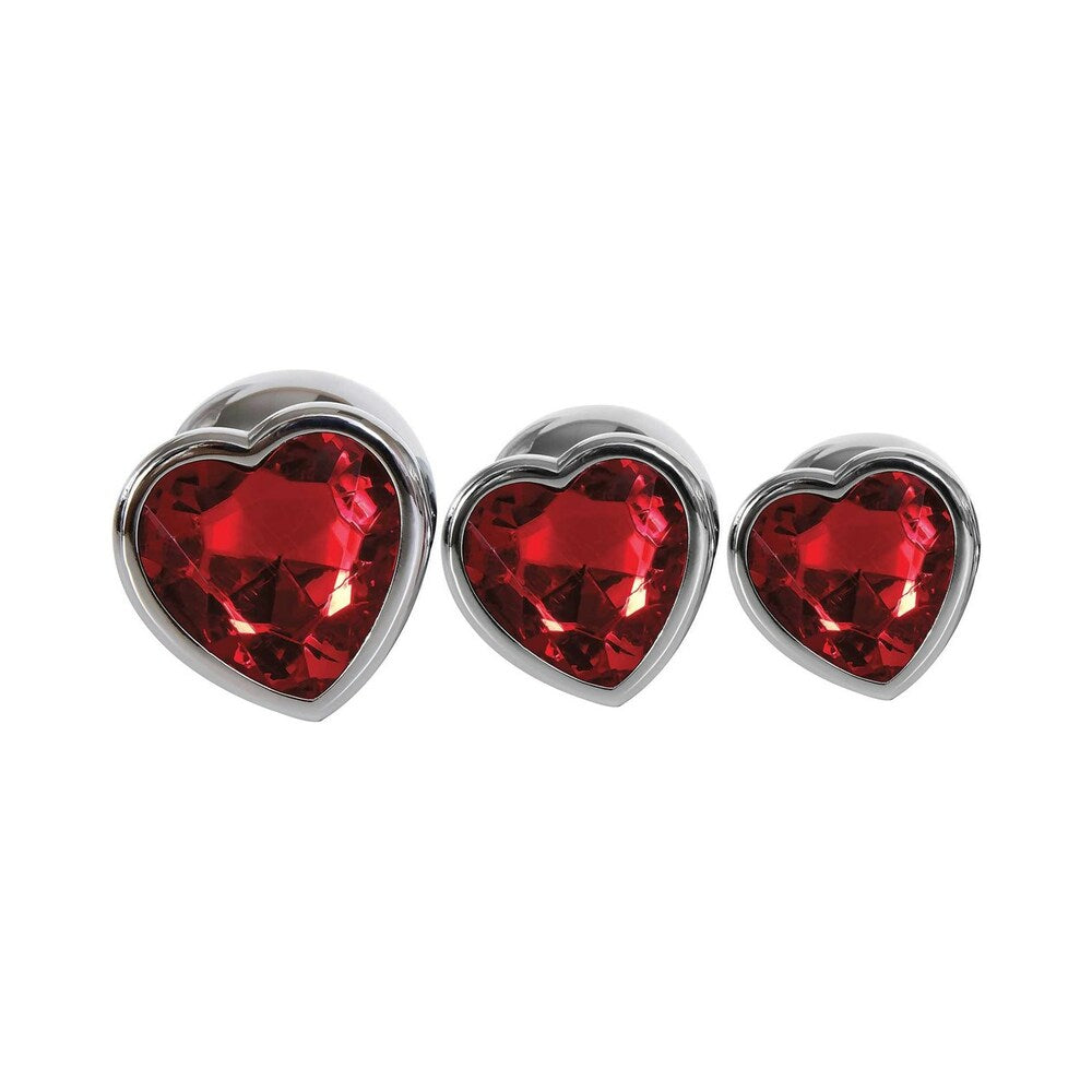 Adam & Eve Three Hearts Gem Anal Plug Set featuring three heart-shaped jewel anal plugs with polished metal design.