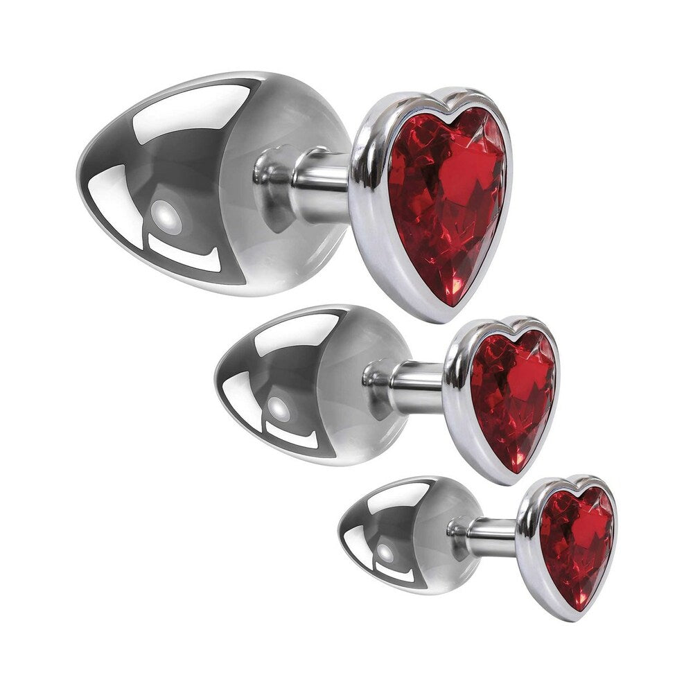 Adam & Eve Three Hearts Gem Anal Plug Set featuring three heart-shaped jewel bases in polished metal design.